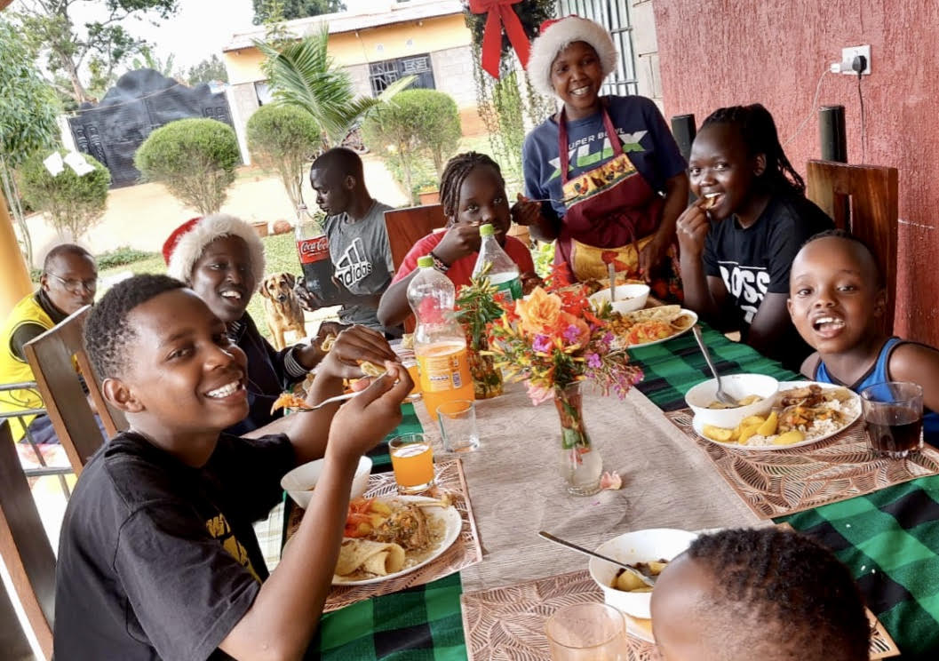 Children celebrating Christmas with our staff members (their aunties and uncles)
